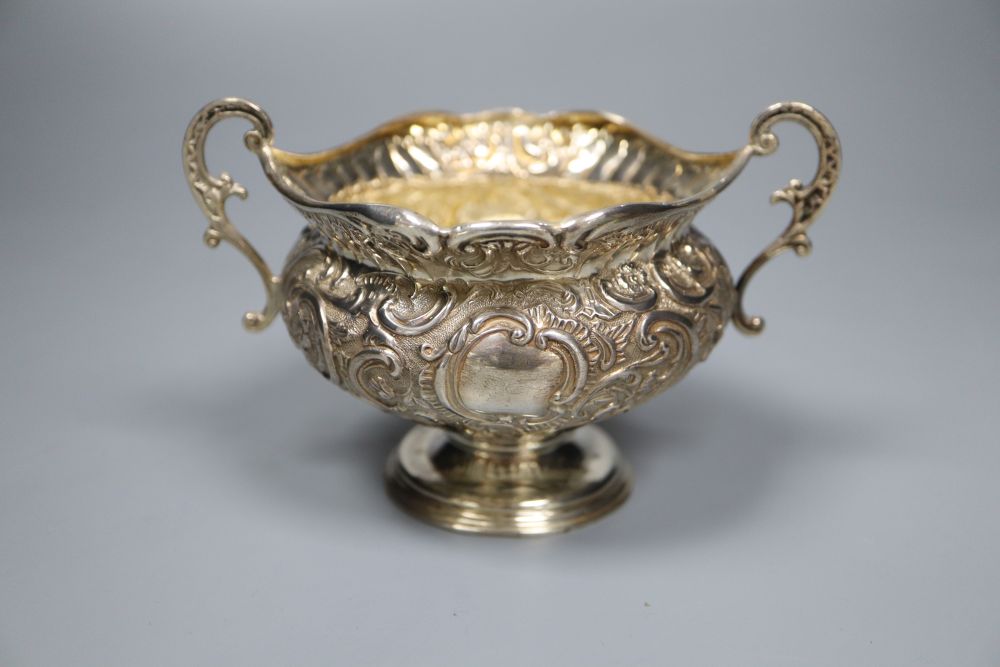 A matched late Victorian 3-piece silver tea set, London, 1897(2) and Birmingham, 1893, gross 20.5oz.